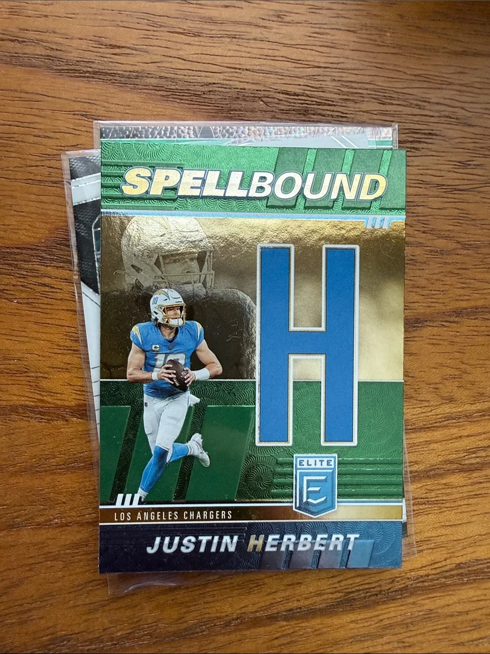Justin Herbert Spellbound Football Card - Elite - Blue & Gold